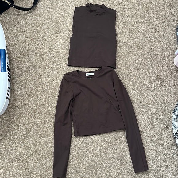 Aritzia Tops - Never worn either brown crop tops